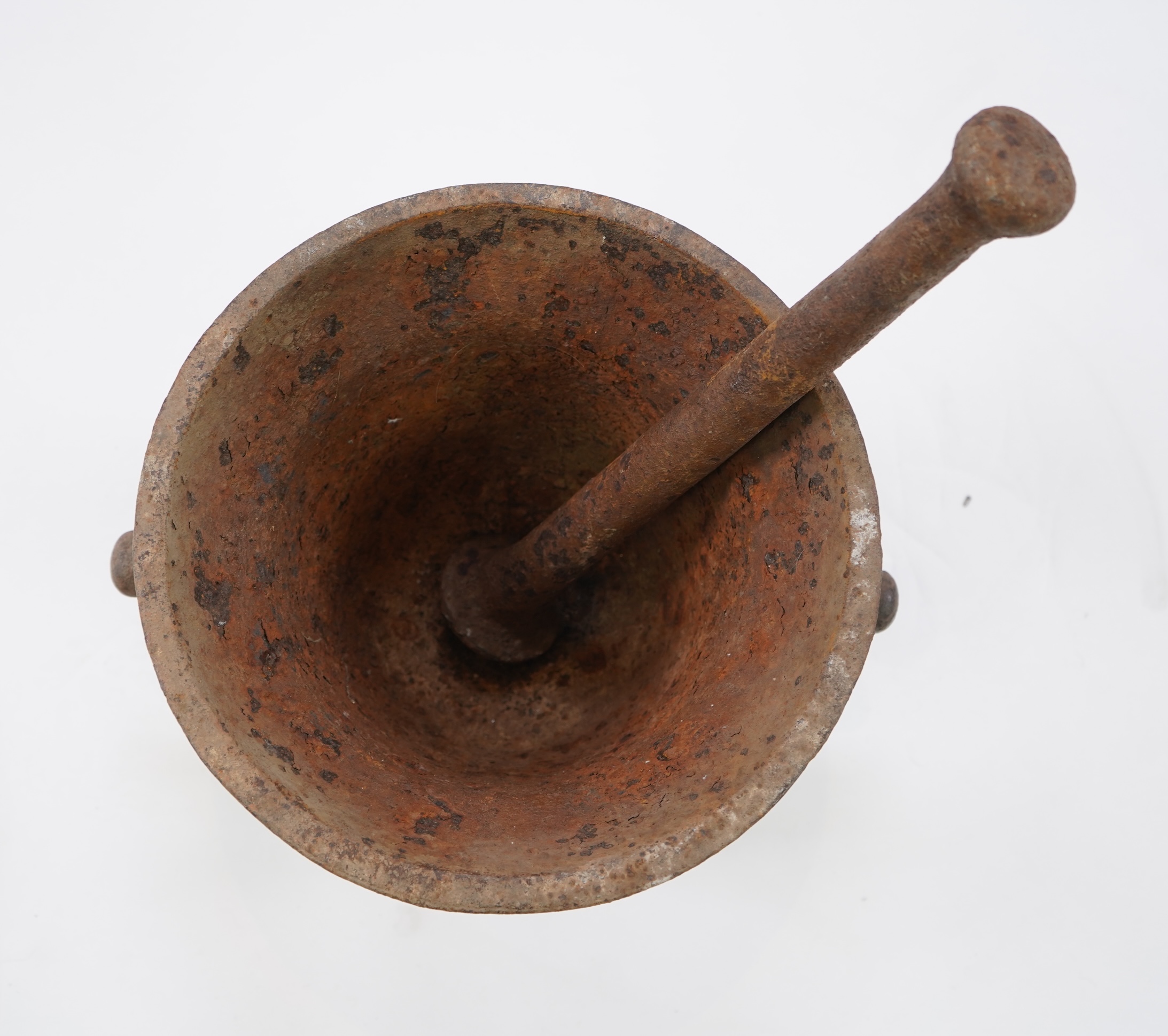 A large 18th/19thc cast iron mortar and pestle